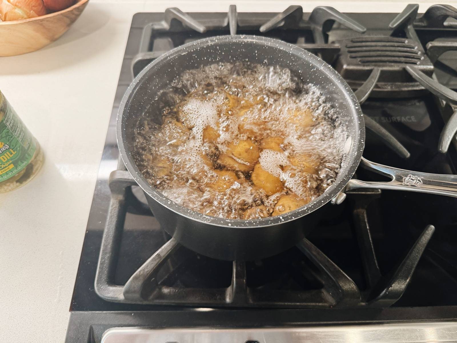 Boiling potatoes on the stove.
