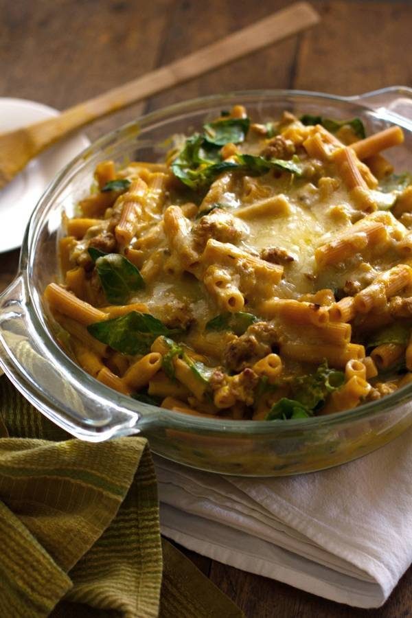 Baked rigatoni in a clear bowl.