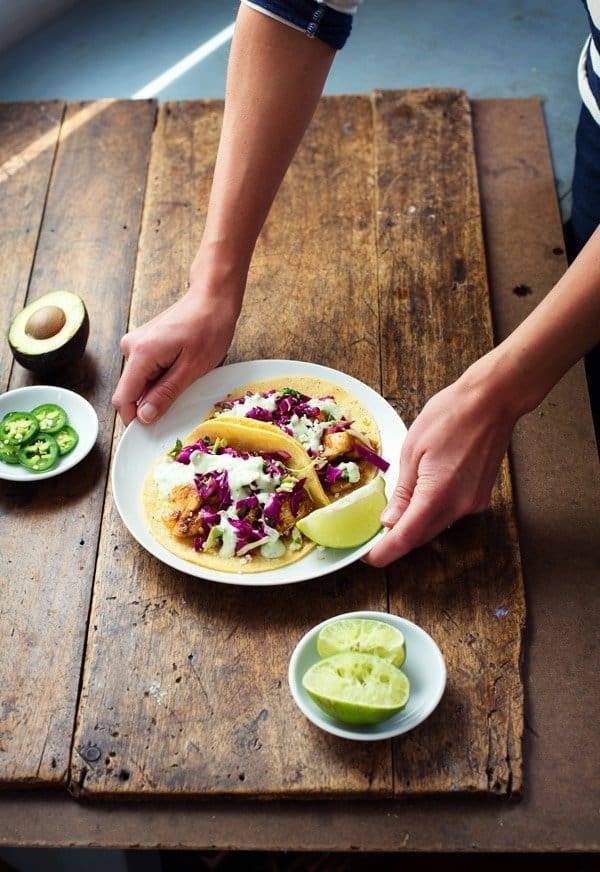 Styling food on a wooden surface.