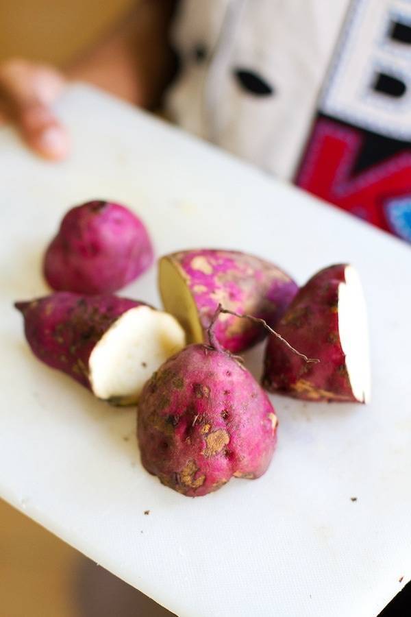 Camotes on a cutting board.