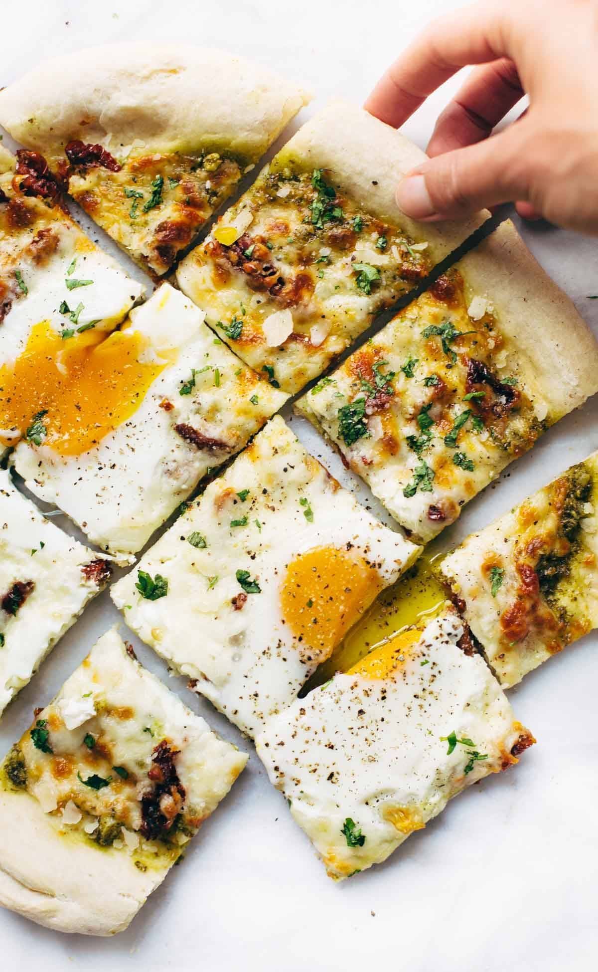 Breakfast Pizza cut into squares.